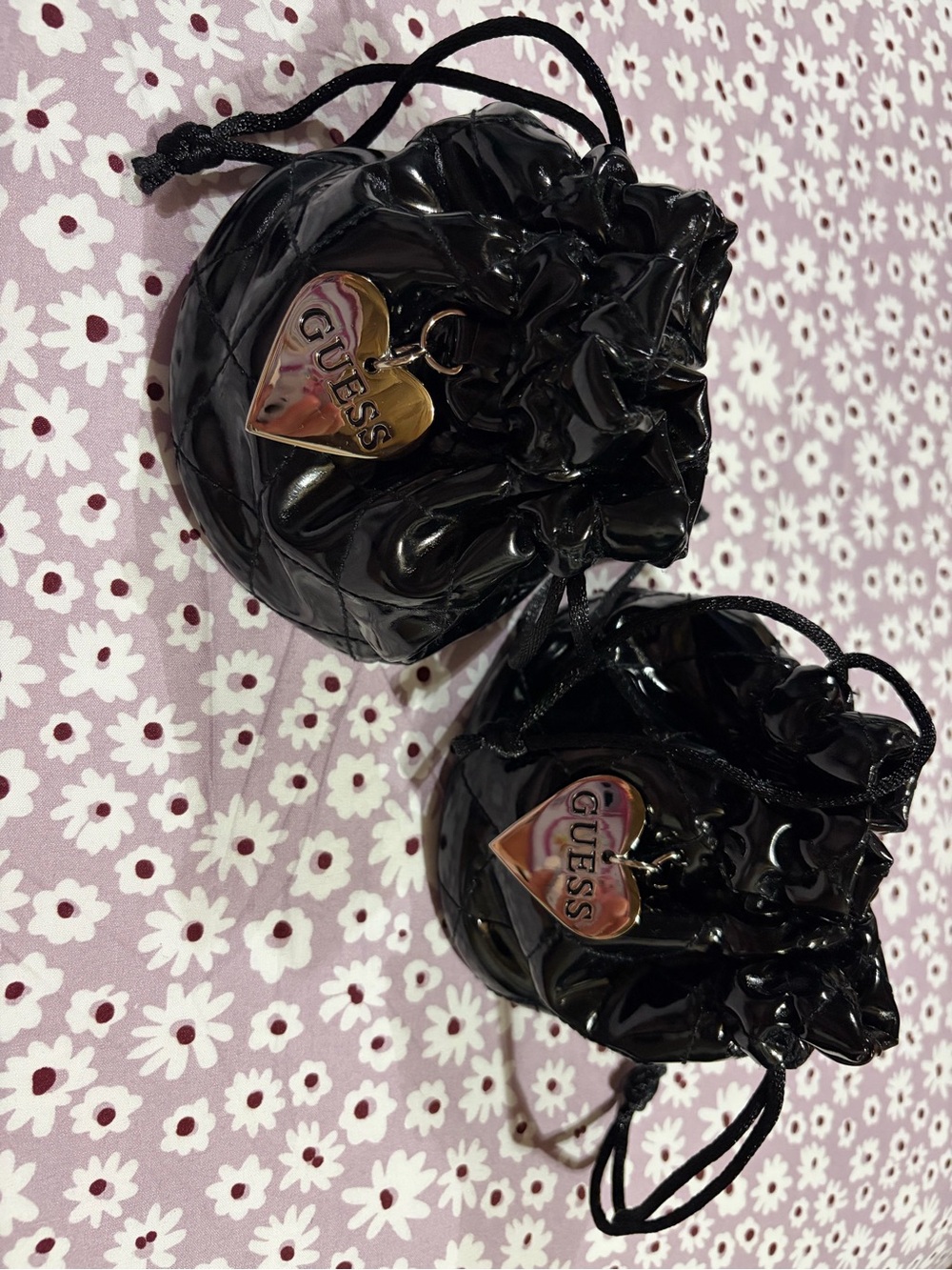 GUESS Black Patent Drawstring Pouches with silver tone Heart Tags